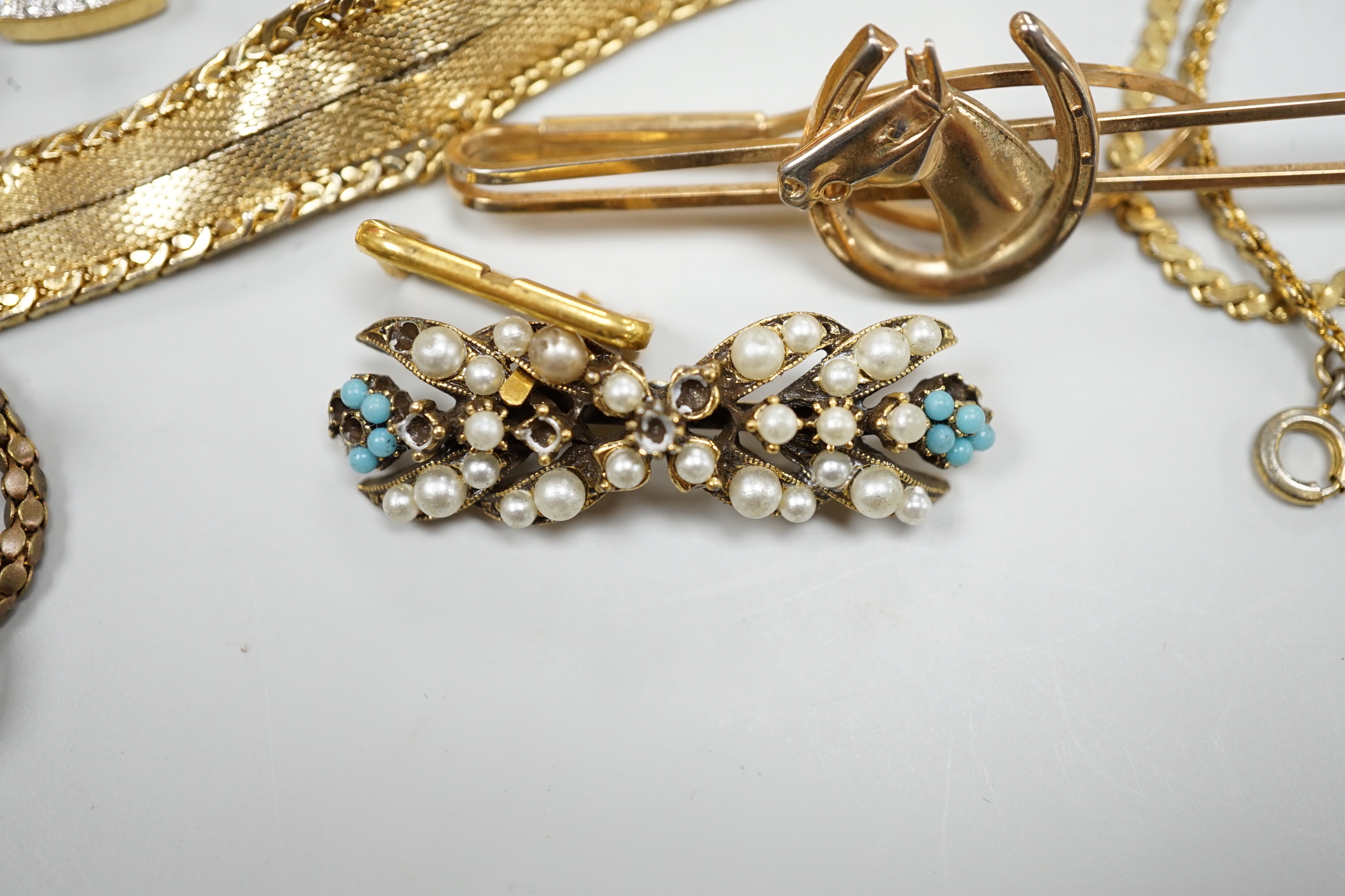 A group of assorted costume jewellery including a brooch in cameo corner leather case, and a small white card Cartier box
